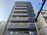 エスレジデンス王子イネーブル 青空を背景に撮影したモダンな外観の建物全景