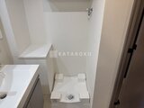 エスレジデンス王子イネーブル 白を基調とした清潔感のあるトイレスペース