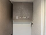 エスレジデンス王子イネーブル 洗面台上の鏡面扉付き収納キャビネット