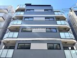 エスレジデンス亀戸バーム 開放的なバルコニーを備えたモダンな建物外観