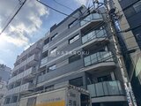 エスレジデンス亀戸バーム モダンなデザインのマンション外観と青空