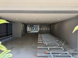 エスレジデンス亀戸バーム 自転車置き場として整備された広めの共用部スペース