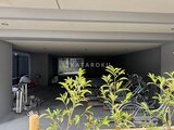 エスレジデンス亀戸バーム 自転車置き場と緑が生い茂る駐輪スペース