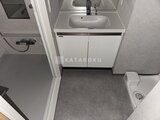 リテラス南千住サウス 洗面台と収納付きの落ち着いた印象の洗面脱衣室