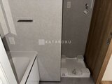 リテラス南千住サウス 洗濯機置き場と小物収納が備わった洗面脱衣室