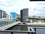 エスレジデンス千住大橋ブロード 河川と橋を見下ろす開放的な眺望とビル群が広がる景色
