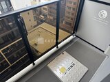クラリティア上野稲荷町 バルコニーから周辺建物が見える眺めの良い窓辺