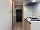 クラリティア上野稲荷町 明るく開放的なキッチンスペースから居室への通路の様子