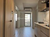 パークアクシス住吉ガーデンスクエア 明るい採光のキッチンから玄関方向を見た空間