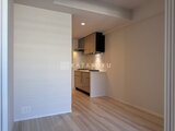 パークアクシス住吉ガーデンスクエア 明るい色合いの独立型キッチンとリビングダイニング空間