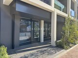 ES-Grande錦糸町ザ・クラス 開放感のあるエントランスと大きなガラス窓が特徴的な建物外観