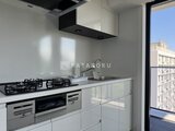 ES-Grande錦糸町ザ・クラス モダンで光が差し込む白基調のキッチン