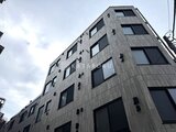 ES-Grande門前仲町デュオ モダンな外装材を使用した6階建てアパートの街角外観