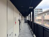 ES-Grande門前仲町デュオ 共用廊下から隣街並みを望むバルコニー空間
