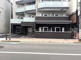 ES-Grande門前仲町 前面道路から見たモダンな外観の建物エントランス