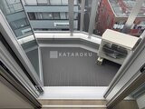 ES-Grande門前仲町 開放的な窓から都市の眺めが広がるバルコニー空間