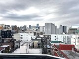 ES-Grande門前仲町 高層階から見た都市風景と周辺の低層住宅街