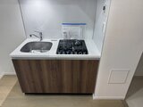 ES-Grande門前仲町 ガスコンロと水栓が付いたコンパクトキッチン