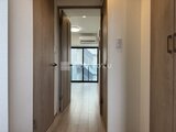 プライムブリス森下スタジオ 明るい廊下から居室へ続く開放的な動線