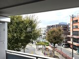 ブランシエスタ品川大井町パークエッジ バルコニーから見た緑豊かな街並みと建物群