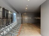 アーバネックス住吉 自動駐輪場が整備されたモダンな共有スペースの様子