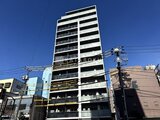 アーバネックス住吉 青空を背景に建つモダンな外観の建物全景