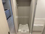 アーバネックス住吉 洗濯機置き場とバスルームが隣接した浴室周辺の様子