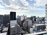デュオメゾン品川戸越 高層階から見た都市風景と青空が広がる眺望