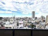 アーバンパーク日暮里2 バルコニーから見た開放的な街並みと青空が広がる眺望