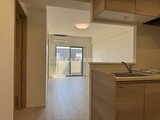 アーバンパーク船堀2 キッチンから繋がる明るいリビングダイニングの奥行きある空間