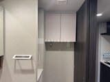 コンフォリア・リヴ茅場町 洗面化粧台と収納棚が備わった清潔感のある洗面脱衣室