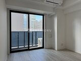 リージア代々木ビナリオ 明るい日差しが入るバルコニー付きの居室空間