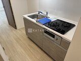 リージア代々木ビナリオ シンク・ガスコンロ・電子レンジ付きのコンパクトキッチン
