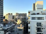 デュオフラッツ大森イースト 高層階からの眺望で都市の建物群が広がる景色