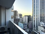 デュオフラッツ大森イースト 高層階からの開放的な都市景観が広がるバルコニーの様子