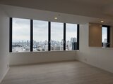 パークアクシス五反田スカイタワー 大きな窓から都心の景観が広がるリビングダイニング