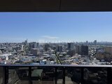 ラグゼナ船堀 バルコニーから見た都市景観と広がる空と青い空