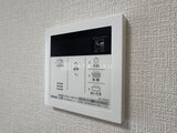 ウェルスクエア幡ヶ谷 壁に取り付けられた浴室暖房乾燥機の操作パネル