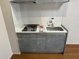 ウェルスクエア幡ヶ谷 ガスコンロと シンク付きのコンパクトなキッチン