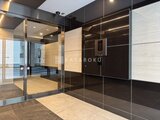 スタイリオ東品川 モダンな内装のエレベーターホールと共用通路