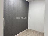 スタイリオ東品川 グレーのアクセントクロスが落ち着いた印象の洋室