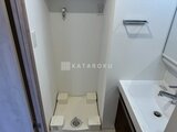 グランカーサ上野松が谷 トイレと洗面台が隣接したコンパクトな水廻りスペース