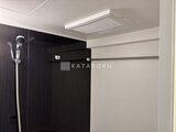 グランカーサ上野松が谷 黒いパネル壁が落ち着いた雰囲気の浴室