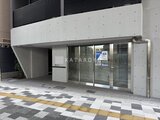 シーフォルム板橋3 モダンなコンクリート仕上げの建物エントランス