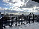 シーフォルム板橋3 ルーフバルコニーから見た広大な都市景観と空の様子