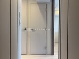 シーフォルム板橋3 清潔感のある廊下からアクセスする複数の部屋への扉