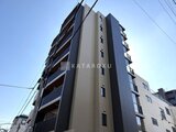 ハイズ三ノ輪2 明るい日中に撮影したモダンなデザインの共有棟外観