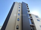 ハイズ三ノ輪2 モダンな外壁の落ち着いた印象の建物外観