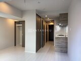 ハイズ三ノ輪2 木調キッチンと洋室が一体の開放的なワンルーム空間