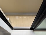 ハイズ三ノ輪2 開放的な開き戸から見た明るいフローリングの室内